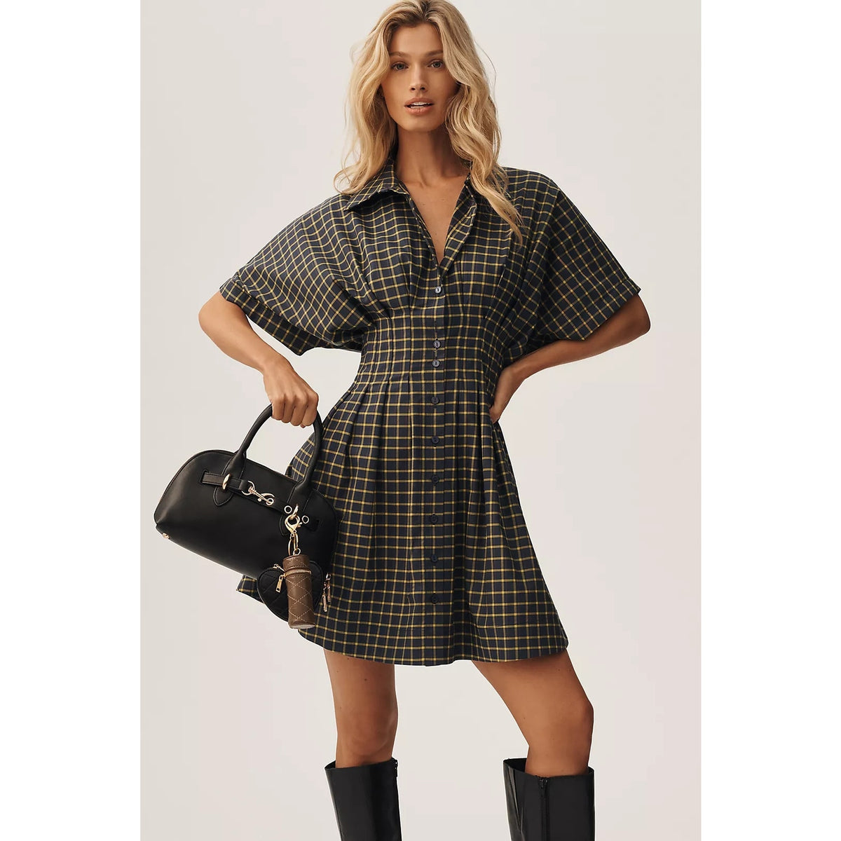 Blue plaid mini shirt dress with short sleeves, collar, and button front