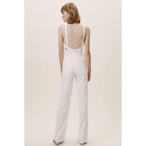 Ivory halter-neck jumpsuit with open back and wide legs