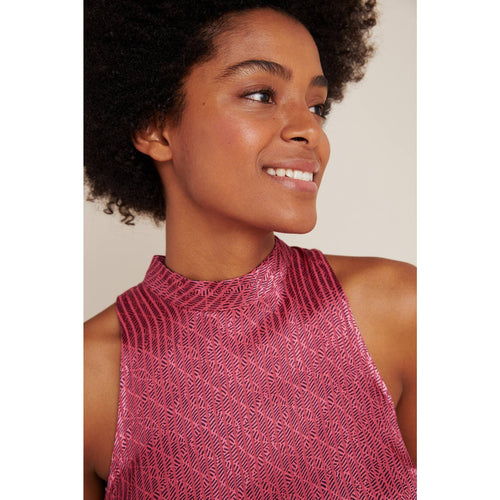 Pink high-neck tank top with sleeveless collar detail and textured geometric pattern