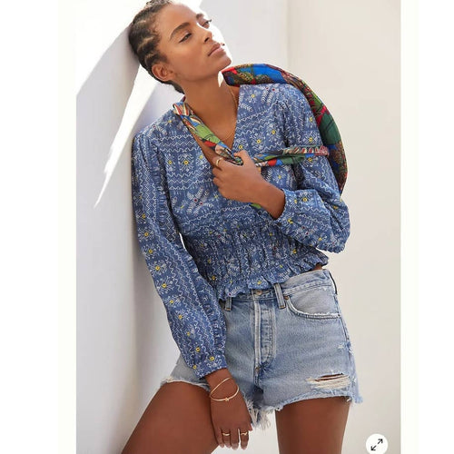 Blue embroidered peasant blouse with smocked waist and long puff sleeves